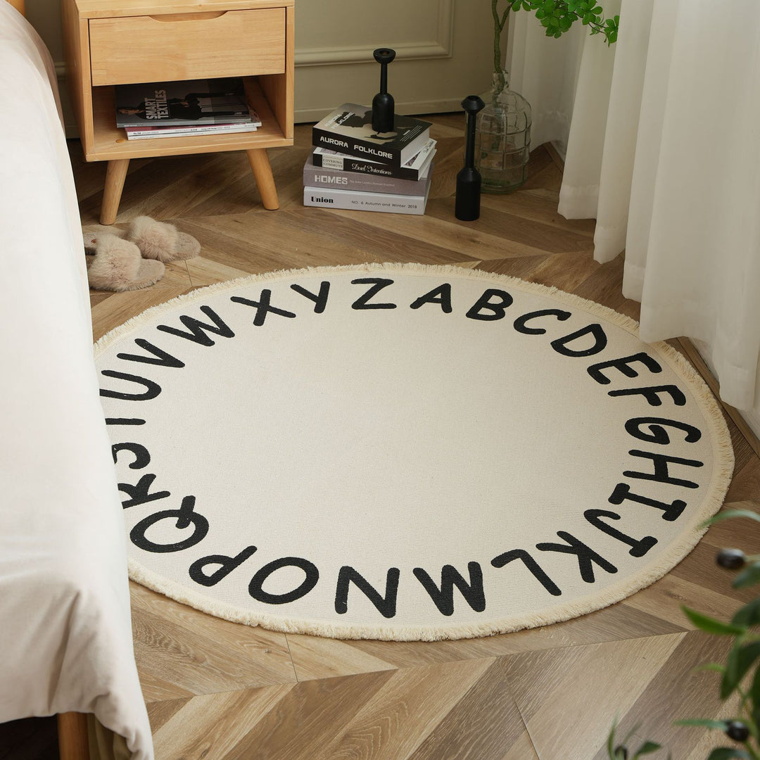 Round woven rug with mandala motif, flat cotton-jute mix and fringes Kalsten