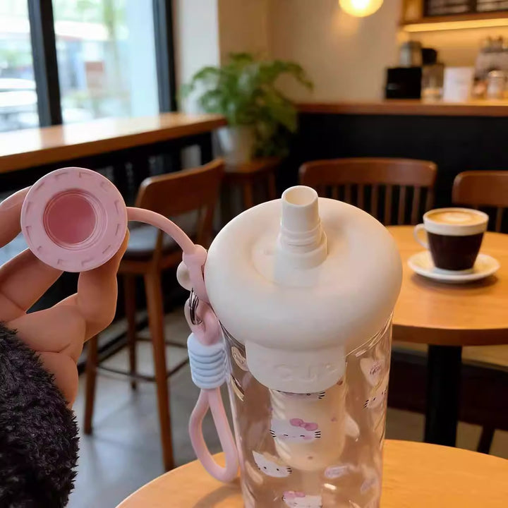 Women's water bottle with cheerful design and practical carrying handle Kalsten