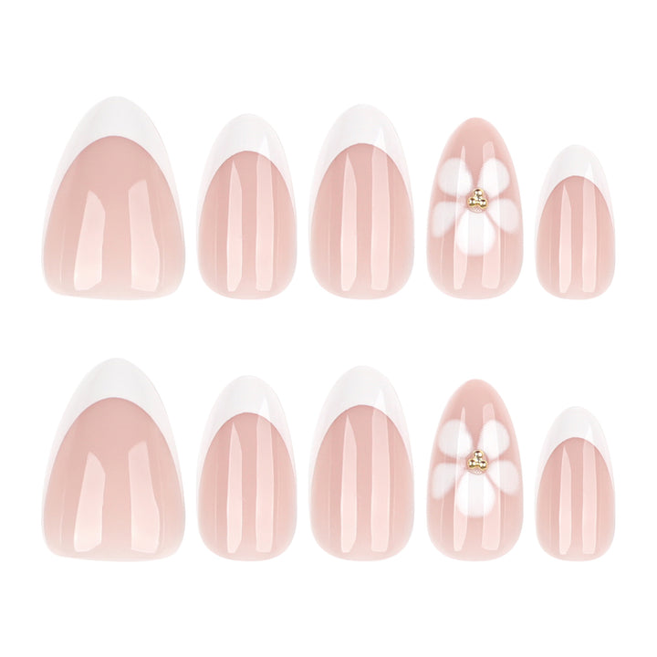 Artful nail extensions with flower design and elegant French tips Kalsten