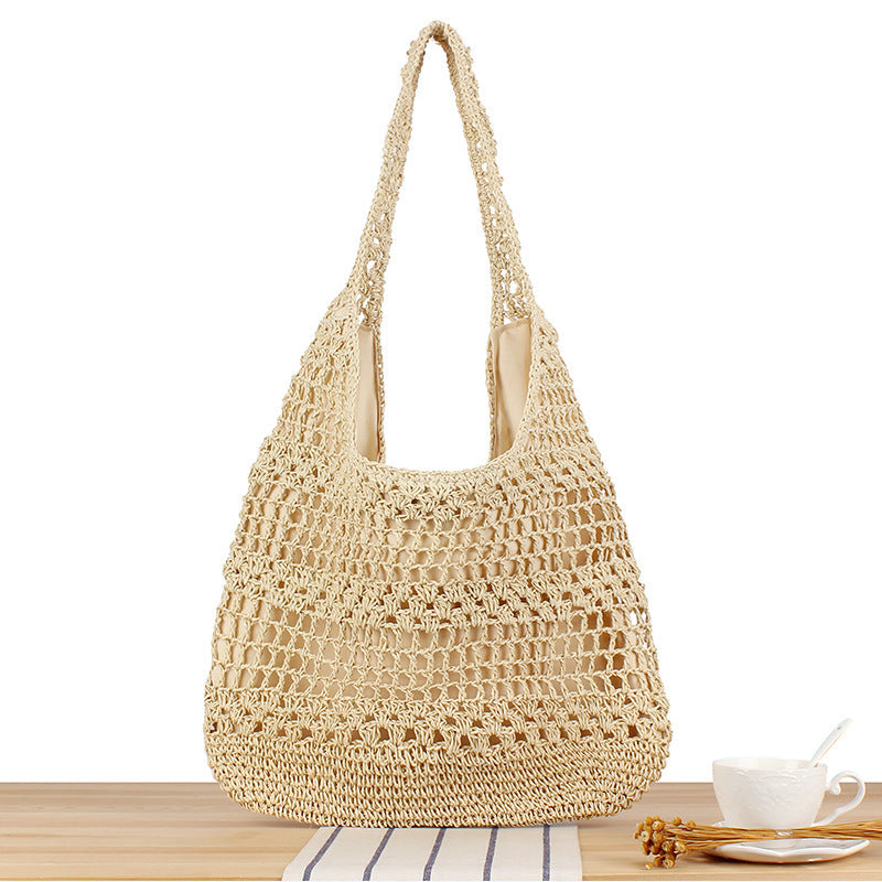 Handbag with floral appliqué Made of natural material Kalsten