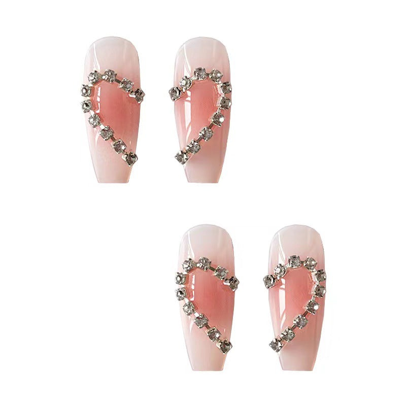 Artistic gel nails with heart accents Kalsten