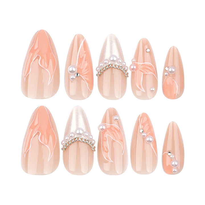 Artistic stiletto nails with pearl and flower embellishments Kalsten