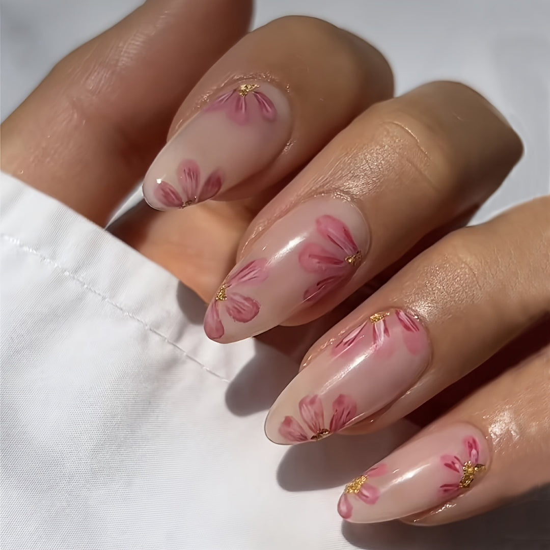 Artificial nail set with floral accents and gold embellishments Kalsten