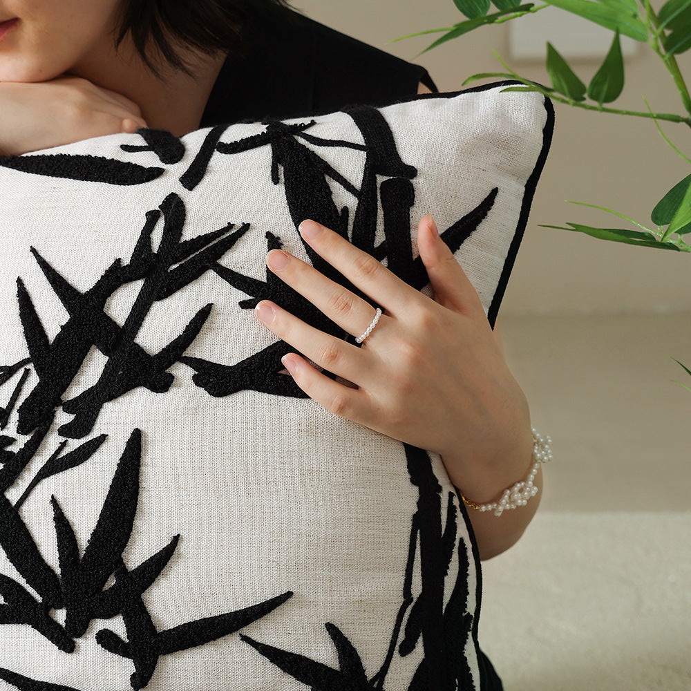 Decorative linen pillow with embroidered bamboo motif Kalsten