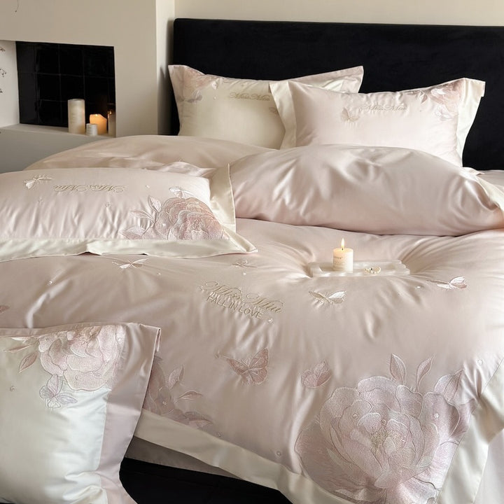 Luxurious satin bedding set with delicate rose and butterfly embroideries