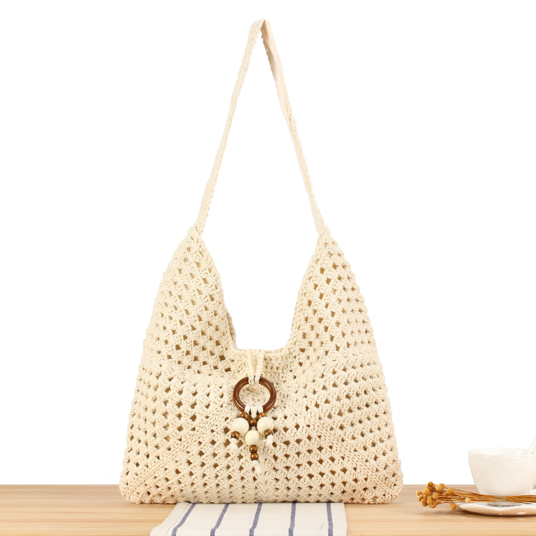 Handbag made of hand-knotted natural material with chic tassel decoration Kalsten