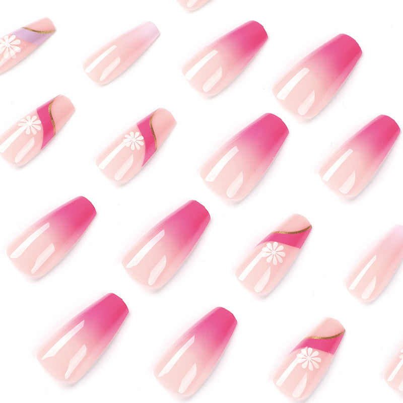 Artful nail extensions with colorful ombre design and floral accents Kalsten