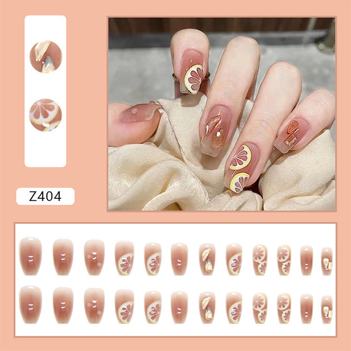 Artificial nail set with cheerful citrus motifs and elegant designs Kalsten