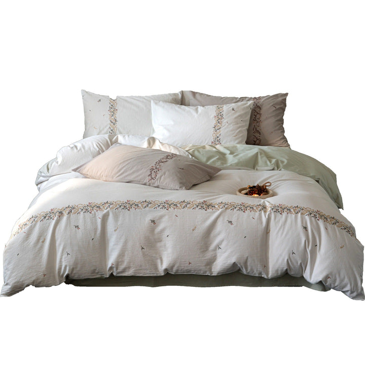 Embroidered cotton percale duvet cover set with fine floral border