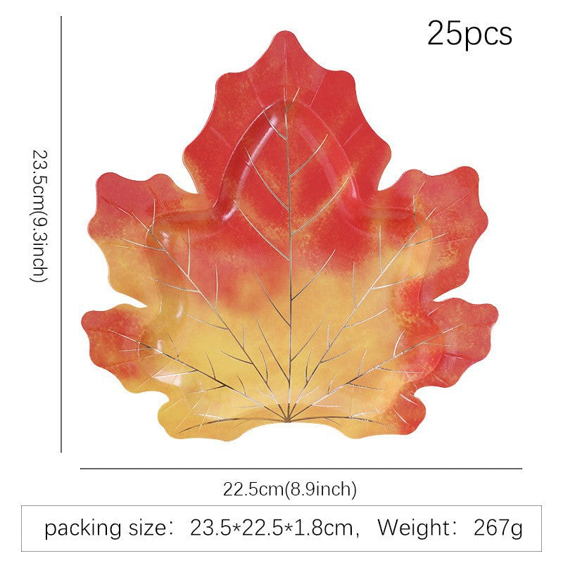 Disposable paper plates in pumpkin shape with spooky face design