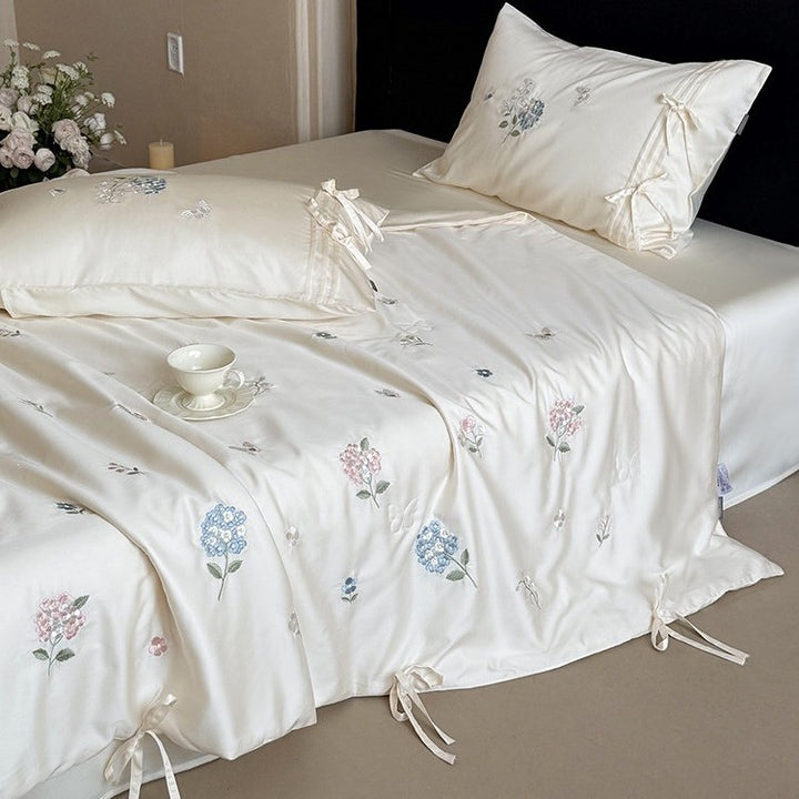 Embroidered satin bedspread set with ties and silky-glossy surface