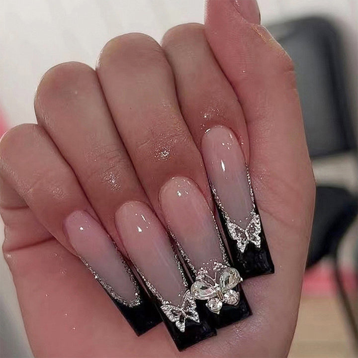 Glamorous artificial nails with rhinestone and butterfly elements Kalsten