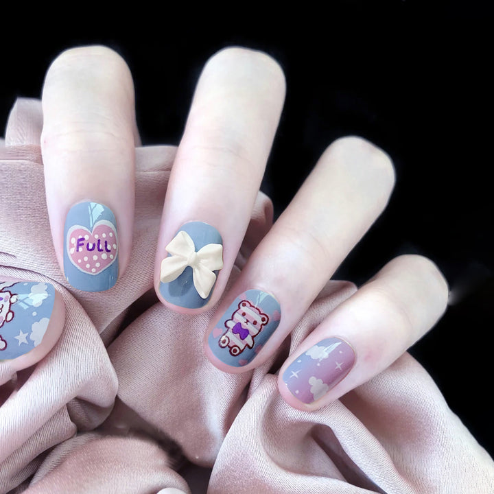 Creative nail art with bow and animal motifs Kalsten