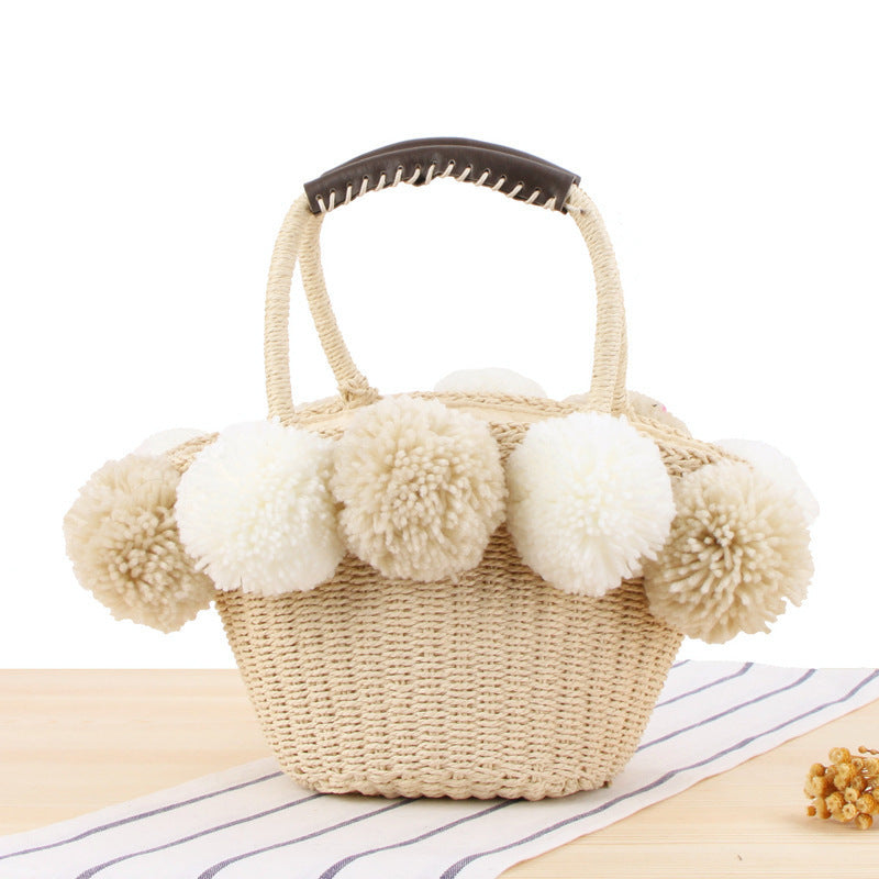 Basket bag with pompom decorated top edge Kalsten