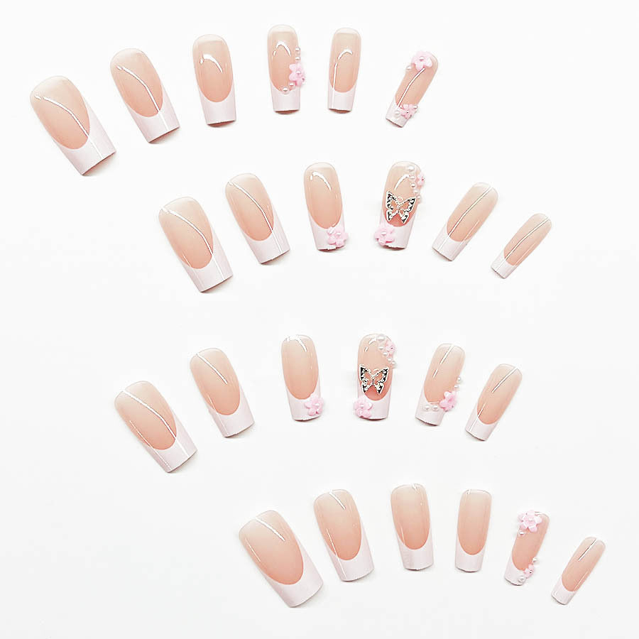 Artificial nail set with playful 3D flowers and glitter accents Kalsten