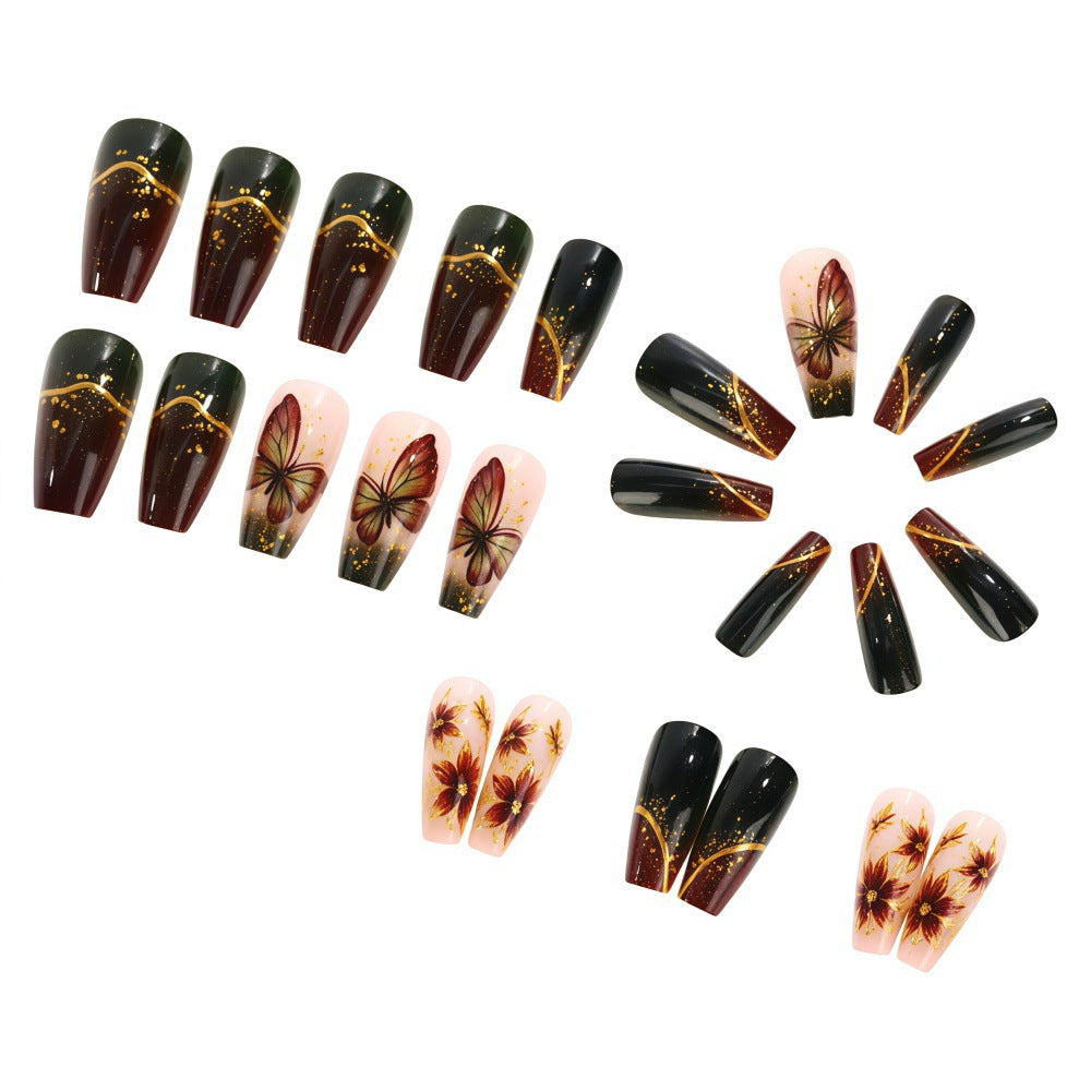 Artificial nails with elaborate butterfly and flower designs Kalsten
