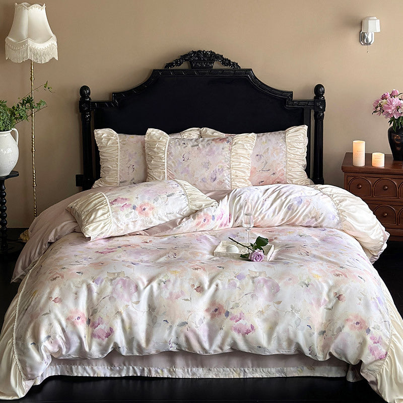 Elegant satin bedding set with watercolor floral pattern, ruffles and gathered pillowcases
