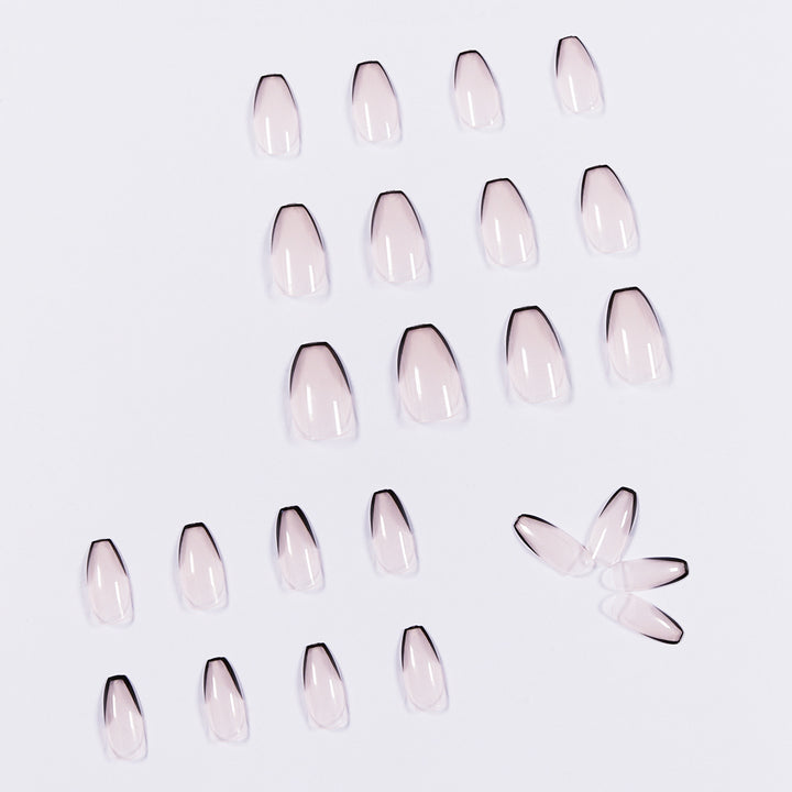 Artful stiletto nails with elegant black tip decoration Kalsten