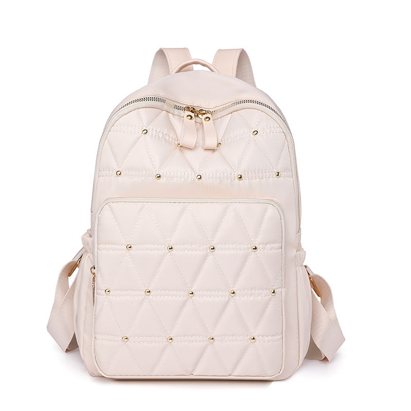 Stylish Quilted Backpack with Gold Accents