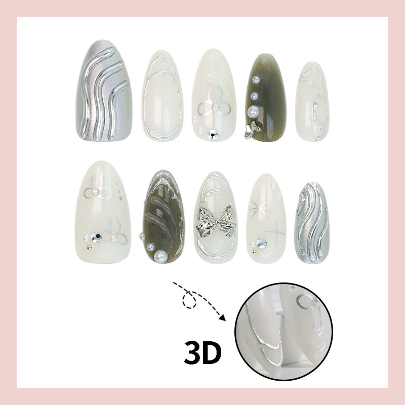 Nail set with luxurious 3D decorations and elegant stone accents Kalsten
