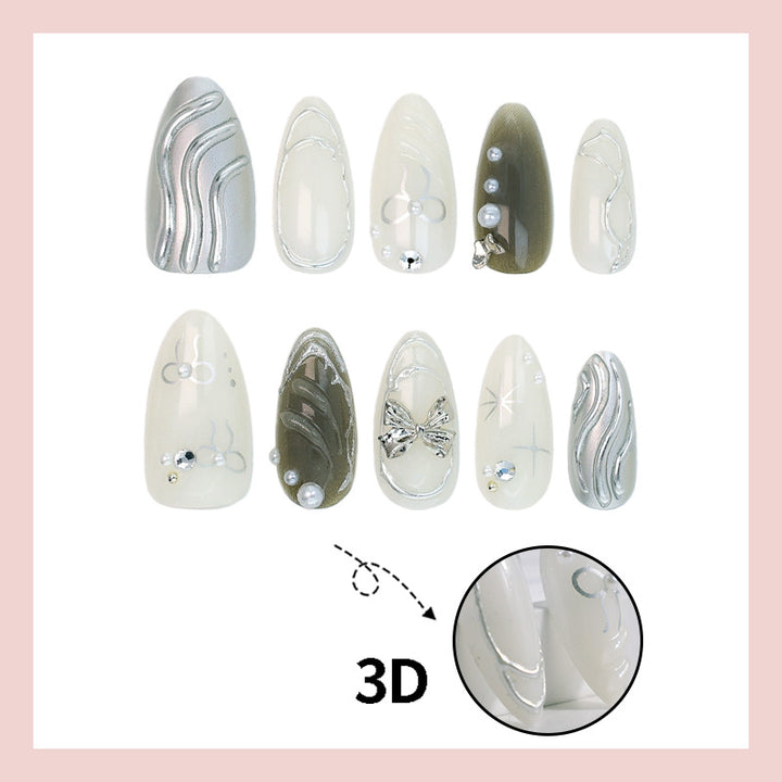 Nail set with luxurious 3D decorations and elegant stone accents Kalsten