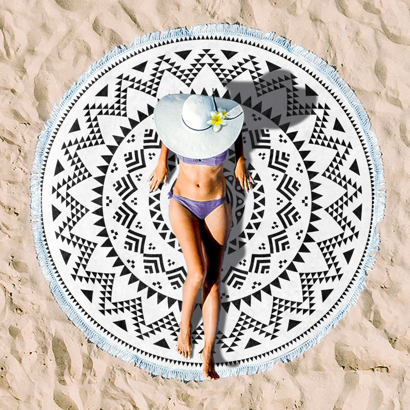 Round beach towel with vibrant tropical pattern Kalsten