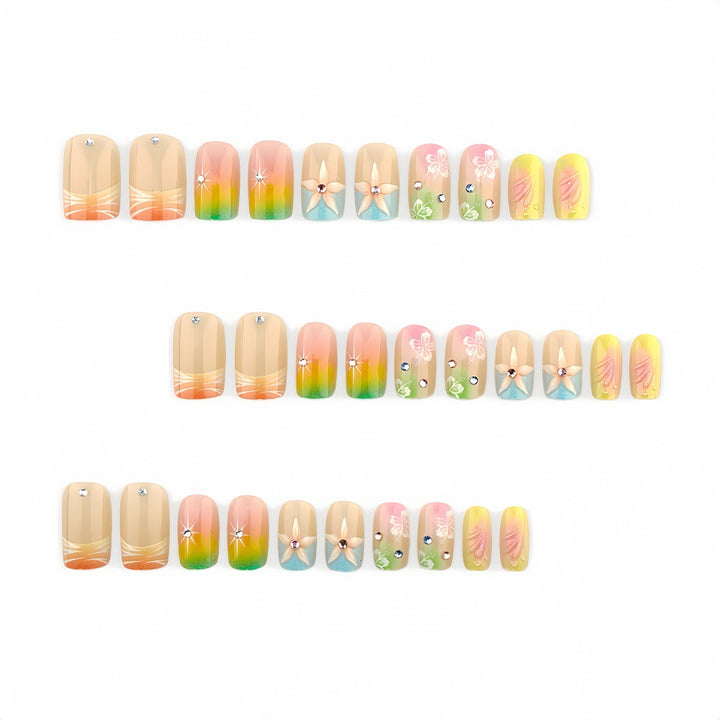 Acrylic nails with floral accents and gradient Kalsten