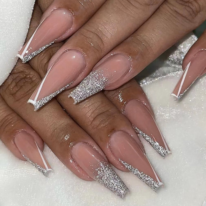 Artful stiletto nails with glitter and French tip Kalsten