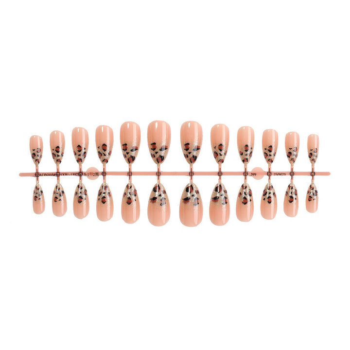 Nail art set with elegant leopard pattern and glitter accents Kalsten