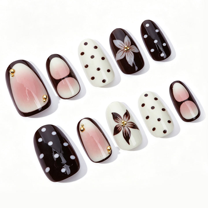Acrylic nail set with floral accents and elegant design Kalsten