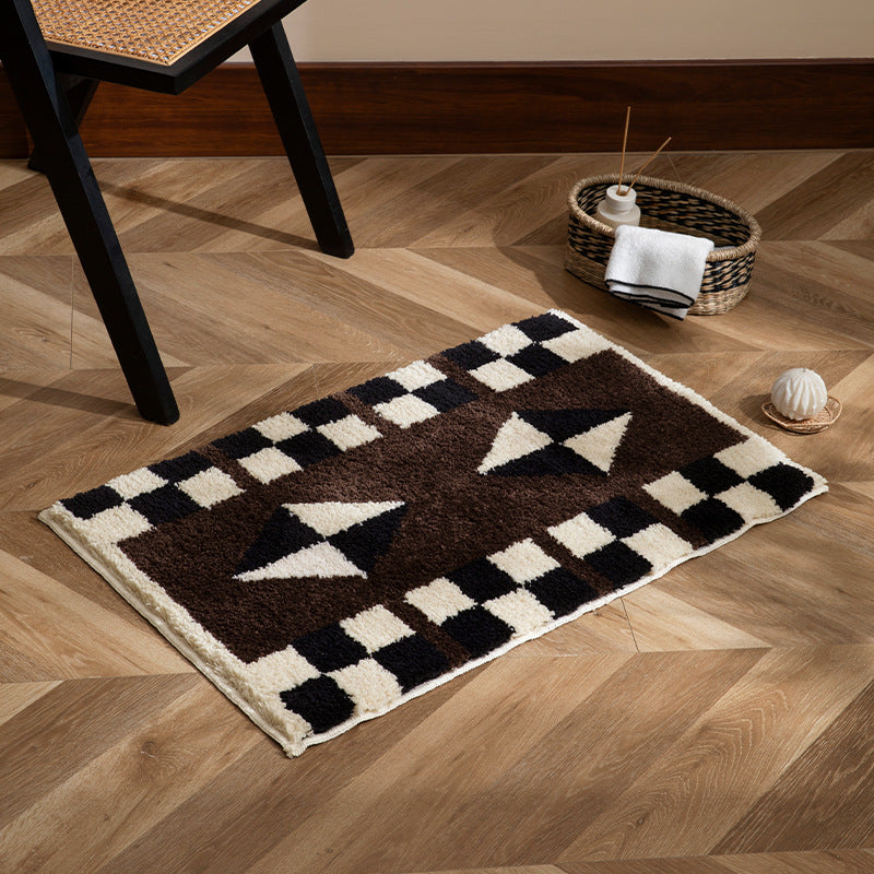 Tufted, soft bath mat with geometric ethnic pattern and non-slip underside Kalsten