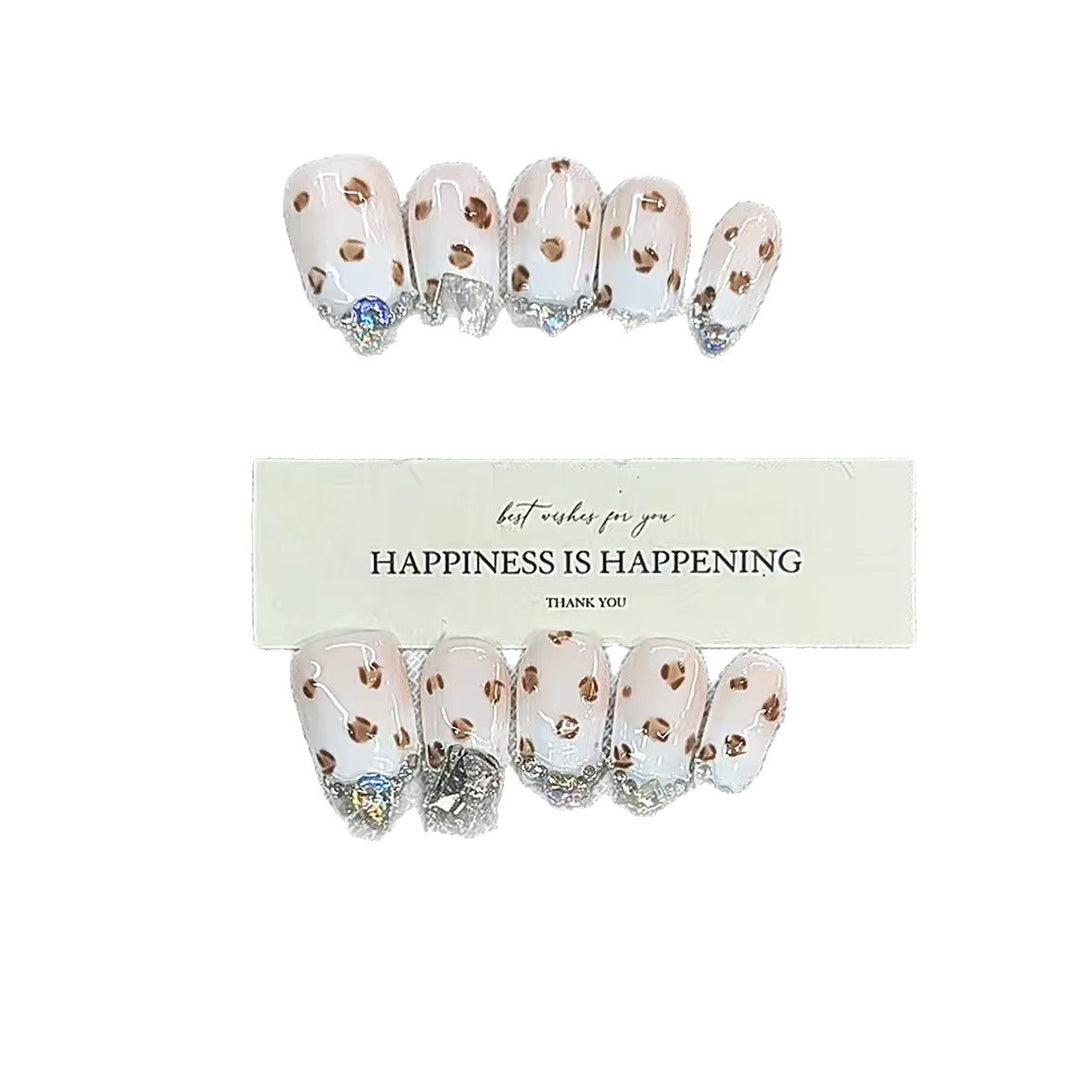 Press-On Nail Art with Glitter and Gem Accents Kalsten