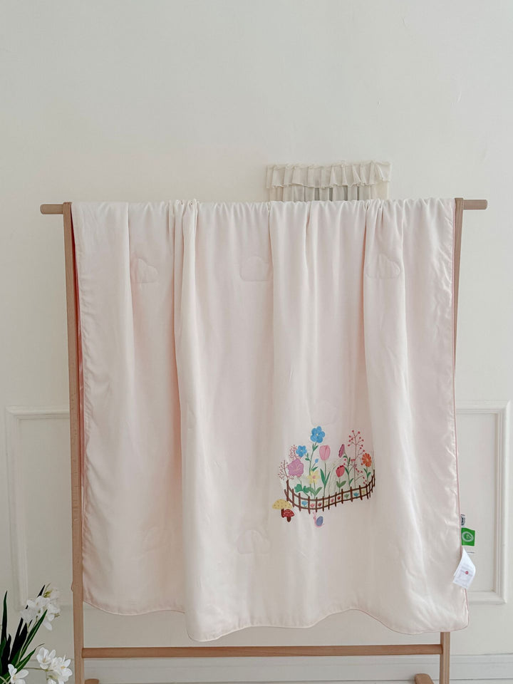 Children's comfort quilt with sweet bunny embroidery and silky satin cover