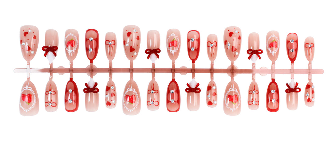 Artificial nail set with cute heart and bow designs Kalsten