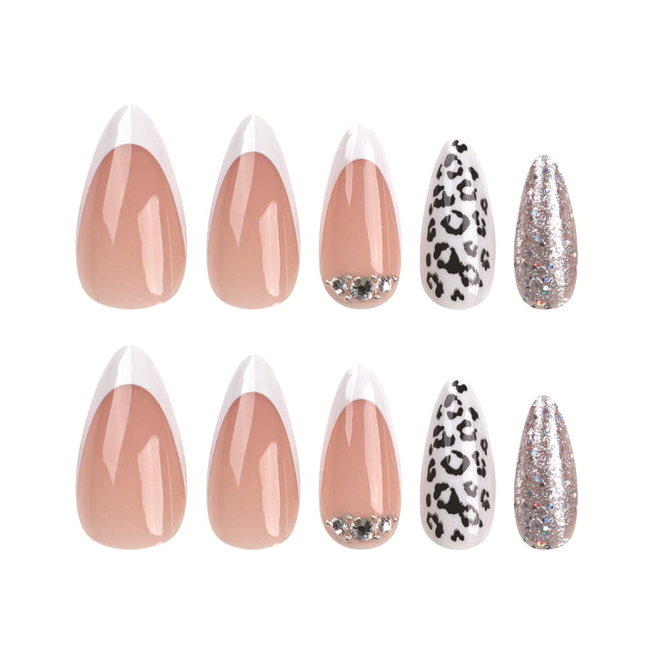 Artful stiletto nails with leopard patterns and glitter accents Kalsten
