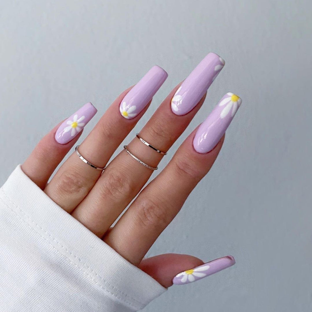 Artistic acrylic nails with flower decoration Kalsten