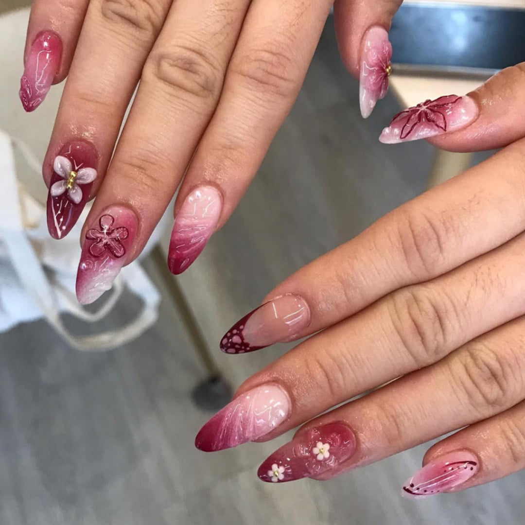 Artful nail extensions with floral details and ombre effect Kalsten