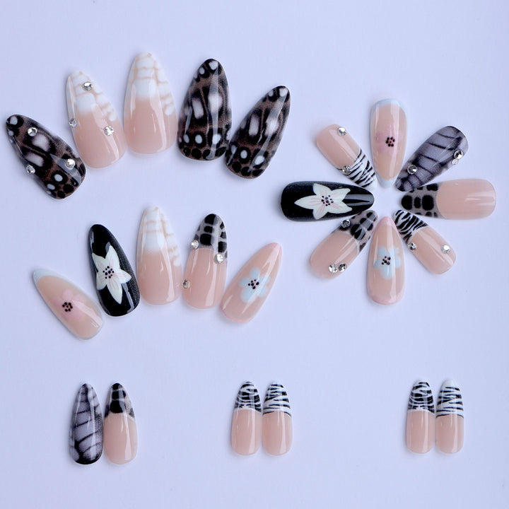 Nail art with elegant designs and embellishments Kalsten