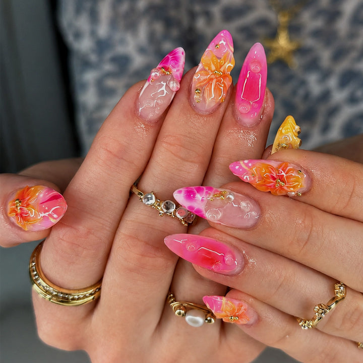 Artificial nail set with floral designs and elegant embellishments Kalsten