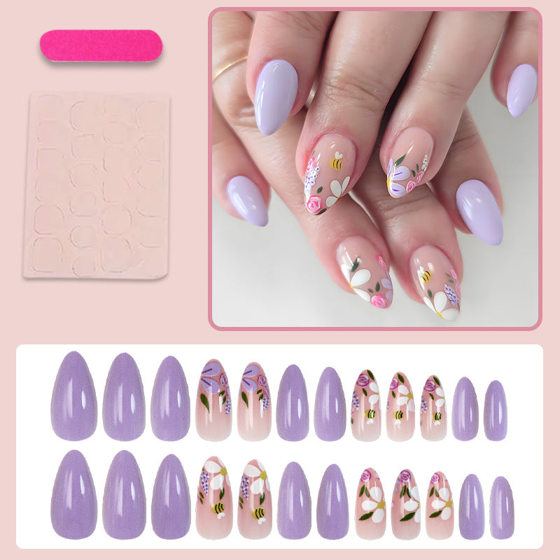 Artificial nail set with playful flower and bee designs Kalsten