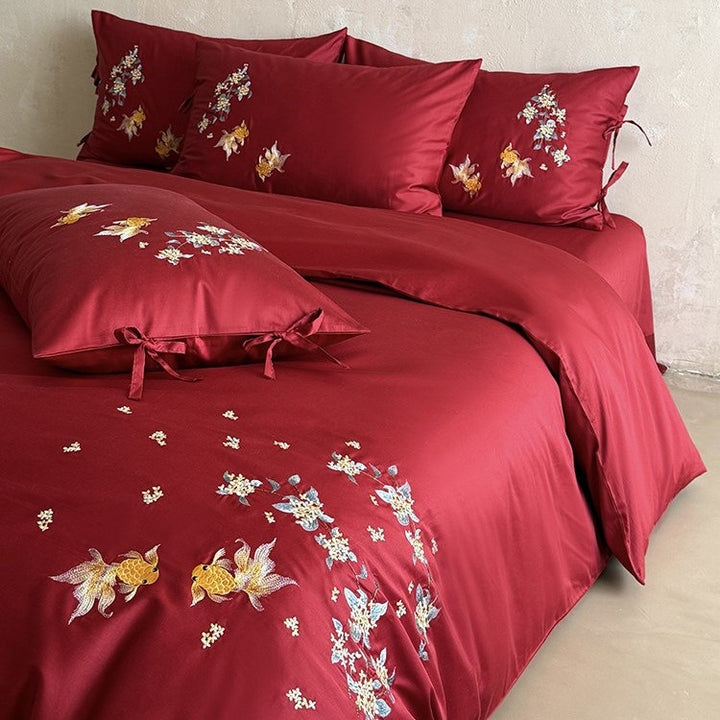 Luxurious satin bedding set with intricate floral-fish embroidery