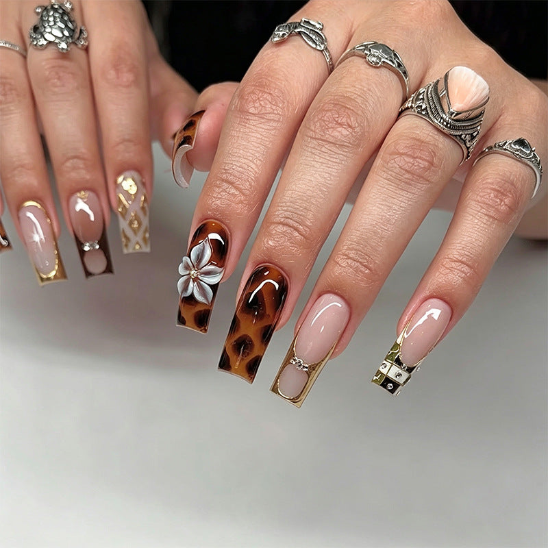 Elegant artificial nails with hand-painted floral accents Kalsten