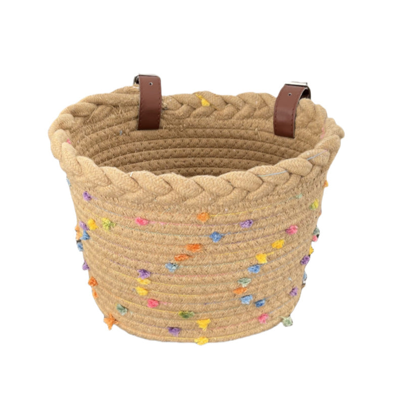 braided rope bike basket with pom pom embellishments and leather handlebar straps Kalsten