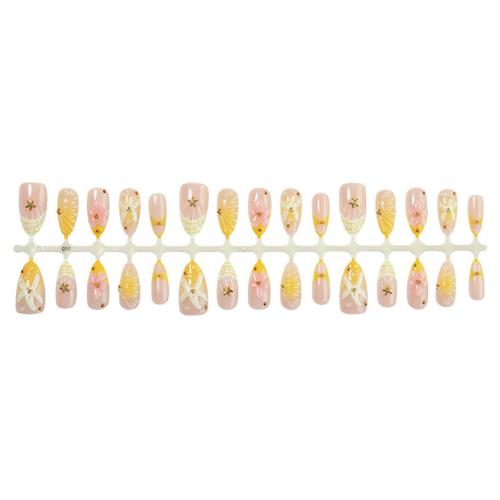Nail art set with handmade floral accents and glitter details Kalsten