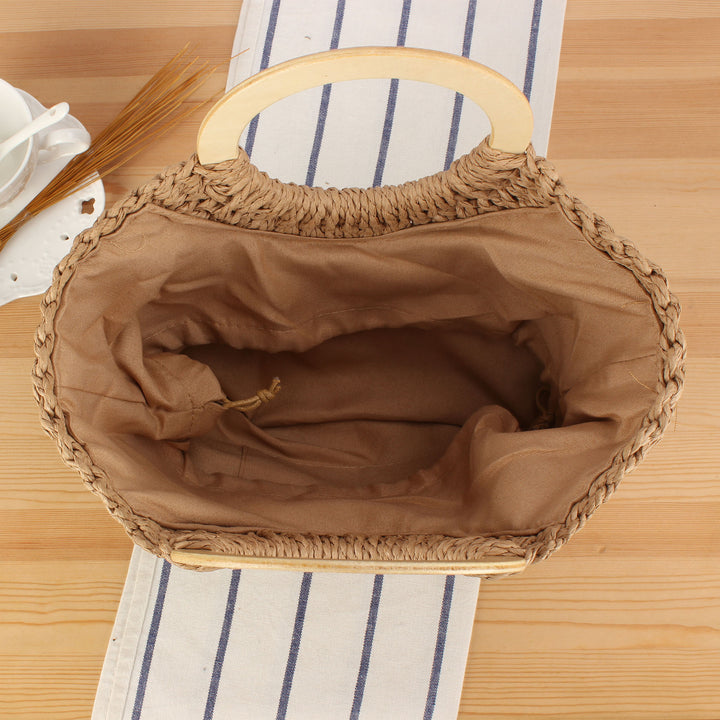 Designer bag made of hand-woven wicker with wooden handle Kalsten