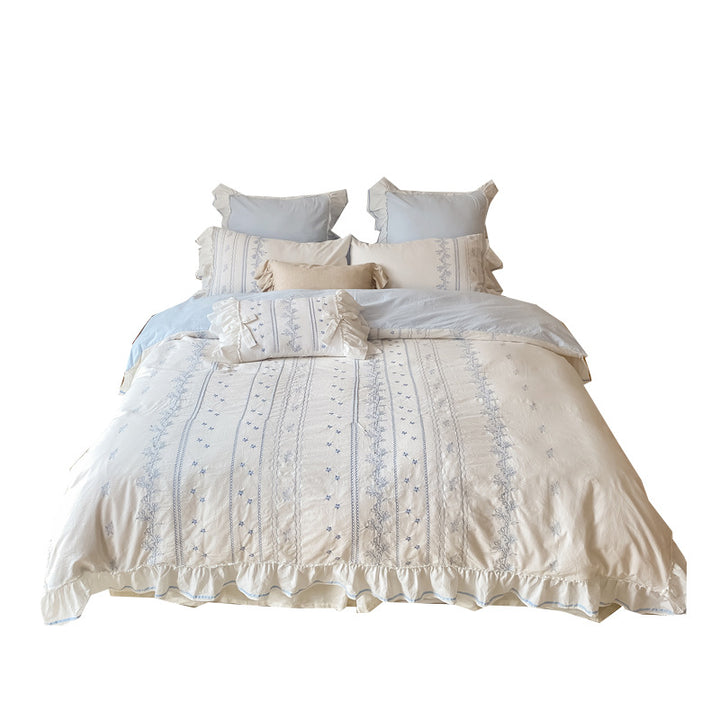 Country house bed set made of cotton with embroidery detail, ruffled edge and integrated bed skirt