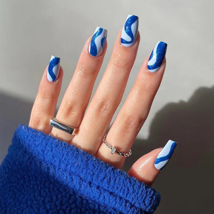 Artful nail extensions with an elegant leaf pattern Kalsten
