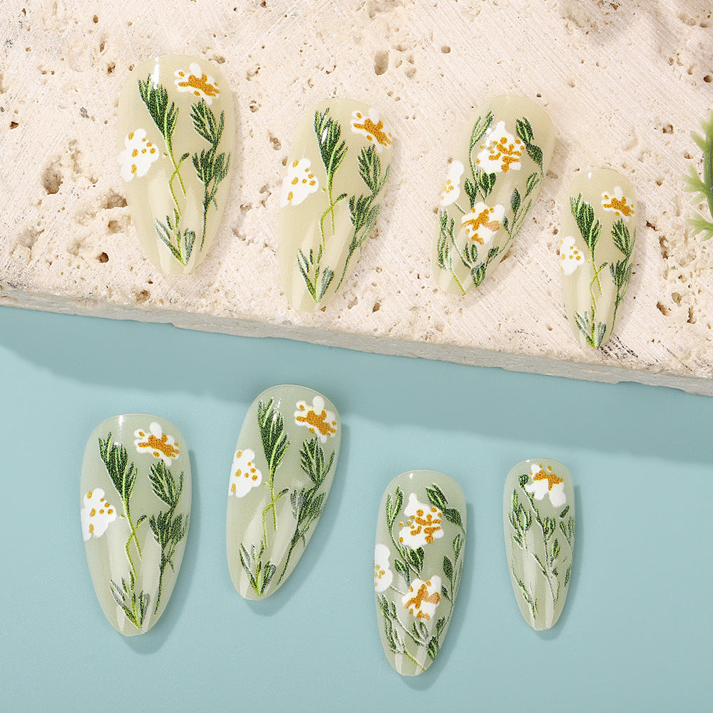 Handmade art nails with floral accents Kalsten