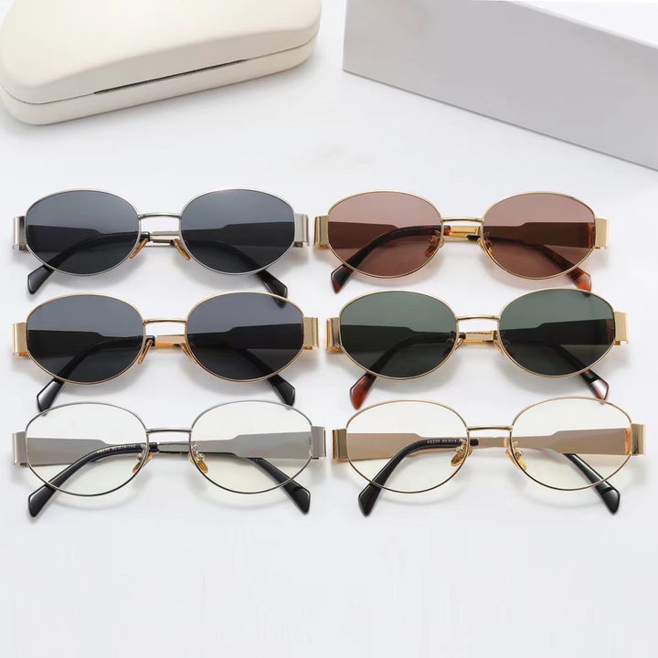 Women elegant oval sunglasses with gold-colored frame Kalsten