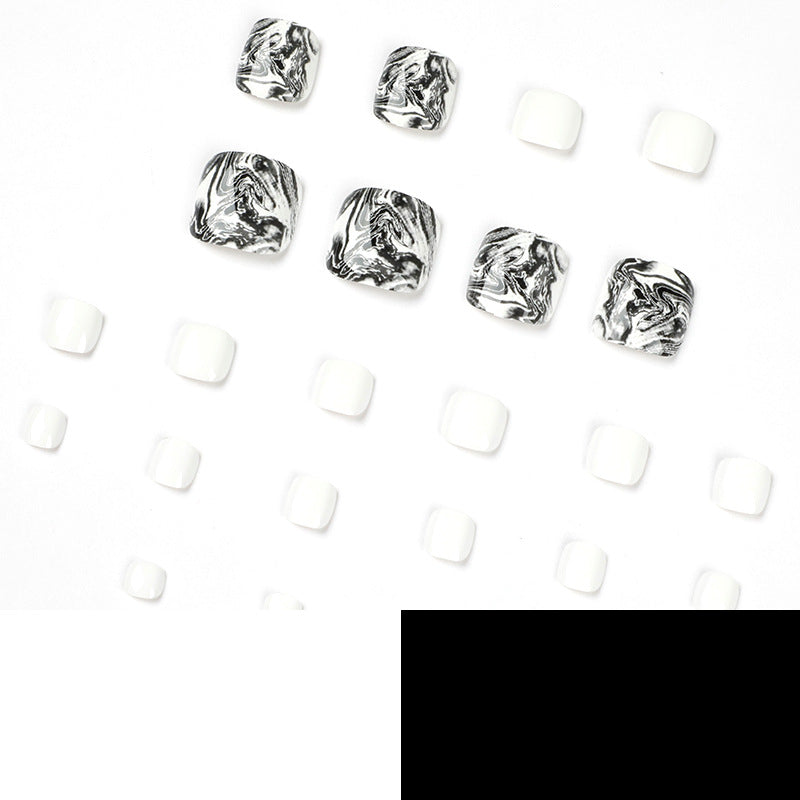 Artful toenail art in elegant marble design Kalsten